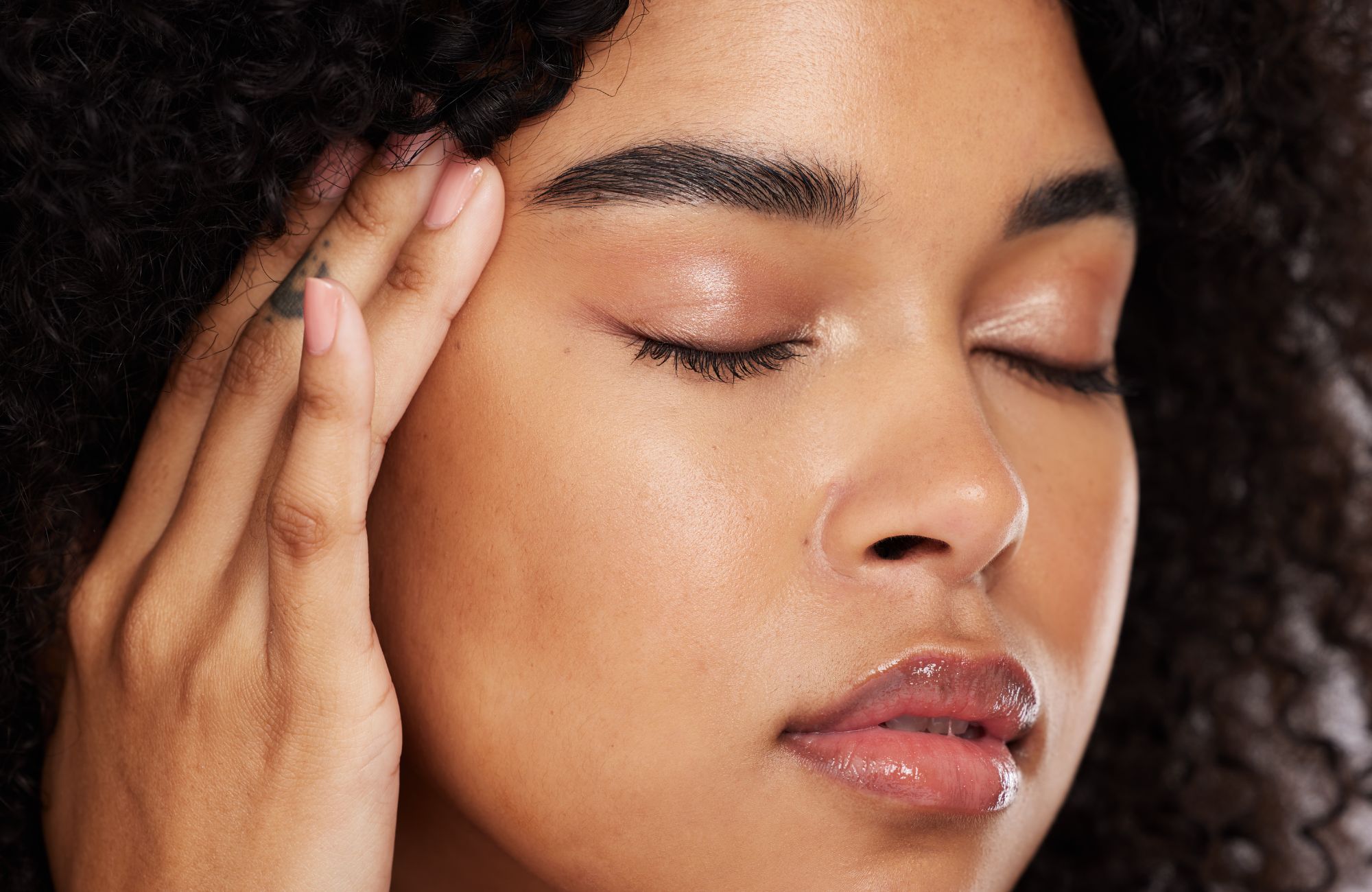 beautiful young woman with her eyes closed